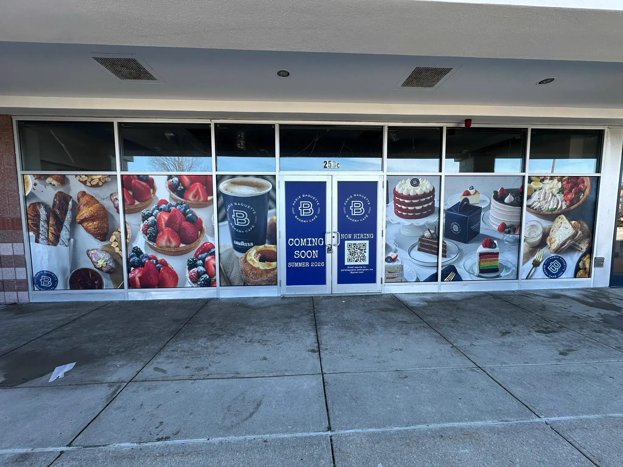 Paris Baguette storefront windows wrapped with pastry and cake imagery