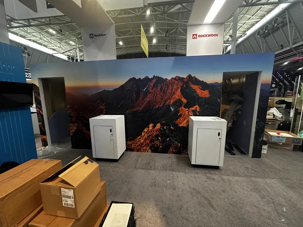 Trade show booth build with large-format landscape graphics